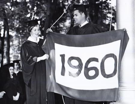 Students raise Class of 1960 flag at Commencement, 1960