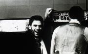 Student laughs while his friend Space Fury, c.1983