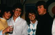 Four friends smile, c.1983