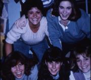 Friends form human-pyramid, c.1986