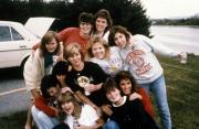 Friends pose by a lake, c.1990