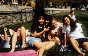 Friends relax on Morgan field, c.1995