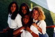 Four girls sit in the sun, c.1995