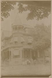 Group in front of house, c.1895