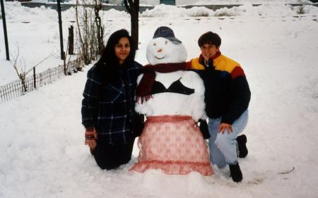 Students build snowman, c.1994