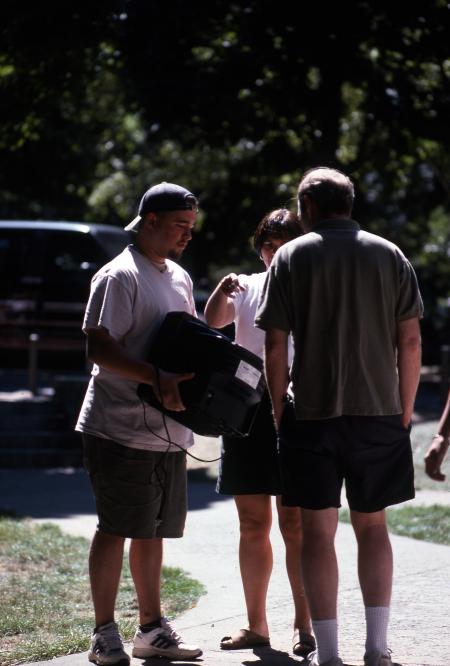 Carrying a TV, 1995