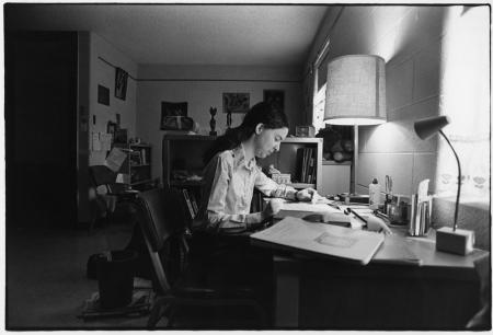 Student studying in dorm room, c.1980