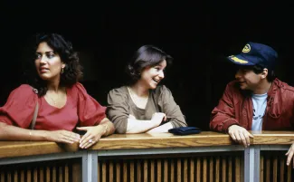 Friends talk in the Holland Union Building, c.1983