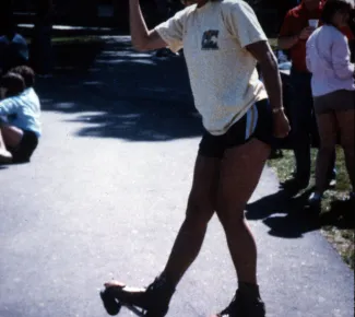 Student dances in roller skates, c.1986