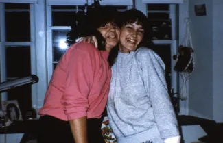 Two friends smile, c.1987