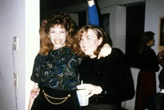 Two girls pose for the camera, c.1990