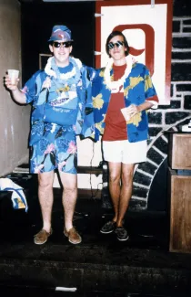 Two students in Hawaiian shirts pose together, c.1990