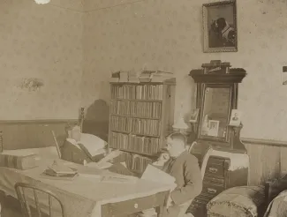 Two students studying, c.1900