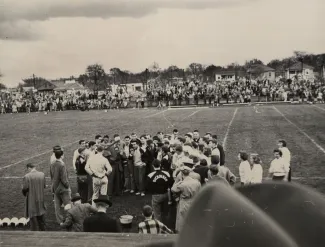 Returning the Mermaid at Homecoming, 1950