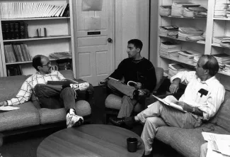 Economics professors with student, 1996