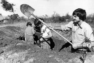 History class digs a trench, 1977