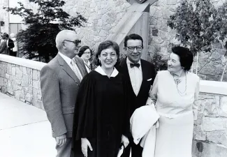 Amy Admunsen with Senator Paul Simon at Baccalaureate, 1984