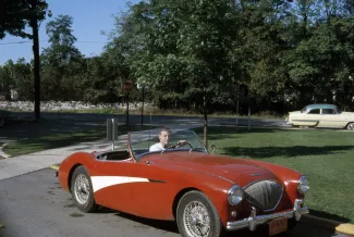 Arthur Duel in his car, 1958