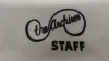 Close-up of "The Archives STAFF" logo